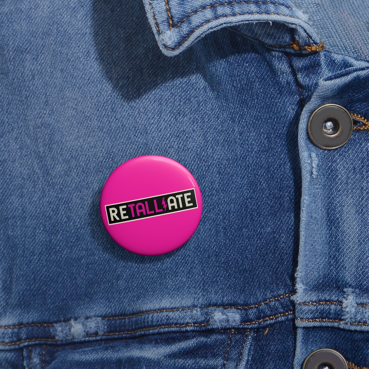 RETALLIATE 1.25” Hot Pink Button